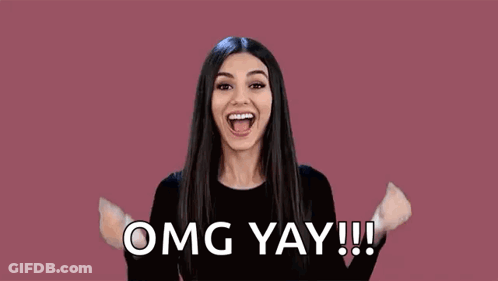 Woman Raising Fist Saying Omg Yay GIF
