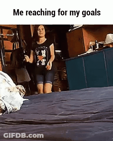Woman Reaching For Goals On Bed GIF