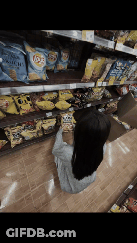 Woman Reaching For Lays Chips GIF