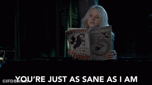 Woman Reading Magazine Saying You're Just As Sane As I Am GIF