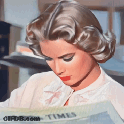 Woman Reading Newspaper Saying Times GIF