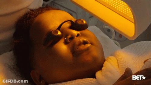 Woman Receiving Facial Treatment GIF