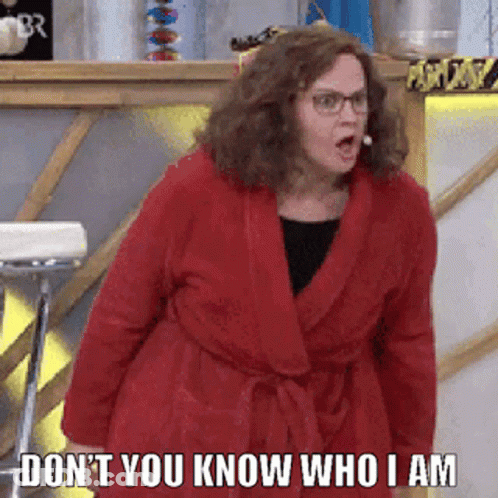 Woman Red Robe Funny Face Don't You Know Who I Am GIF