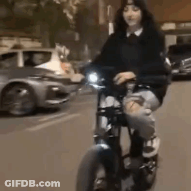 Woman Riding Motorcycle In Front Of Car GIF
