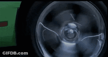 Woman Riding On Back Of Man On Motorcycle GIF