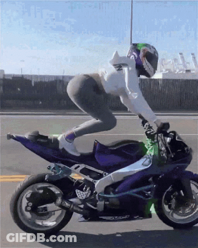 Woman Riding Purple Motorcycle Red Bull Helmet GIF