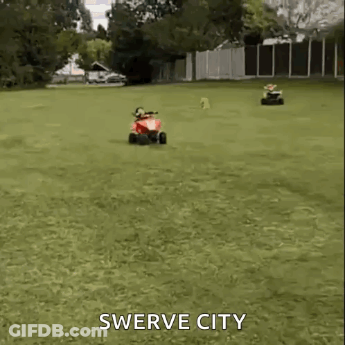 Woman Riding Red ATV Swerve City GIF