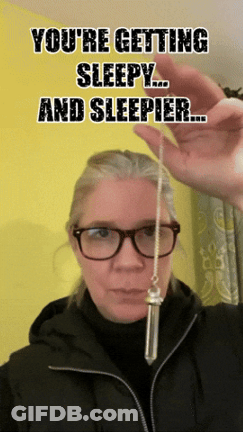 Woman Rocking A Crystal Pendulum GIF