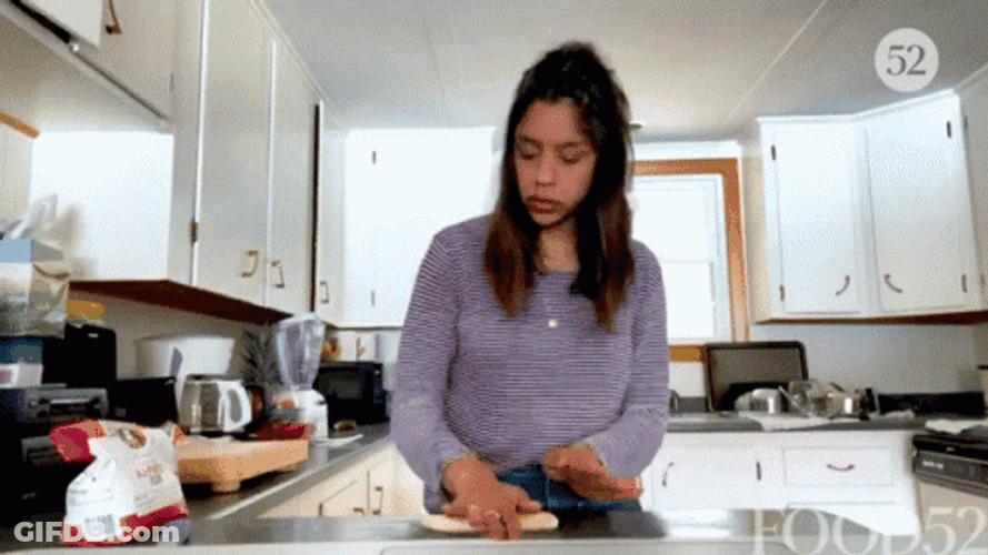 Woman Rolling And Knead Dough GIF