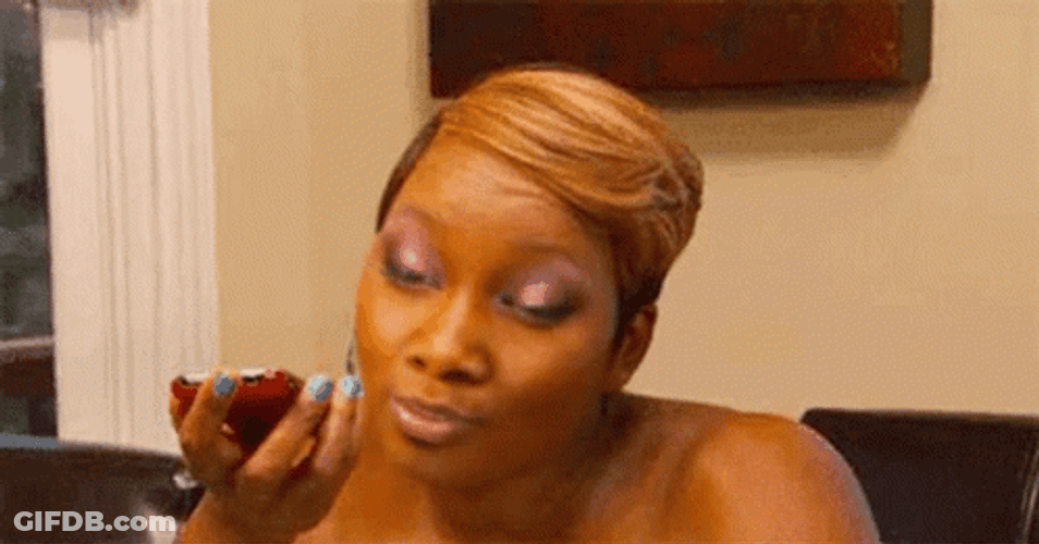 Woman Rolls Eyes While Talking To Her Phone GIF