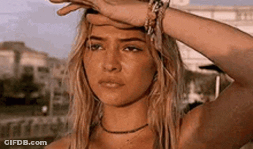 Woman Rubbing Forehead GIF