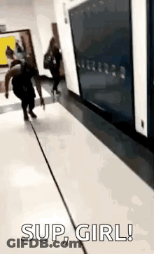 Woman Running Down School Hallway Saying Sup Girl GIF