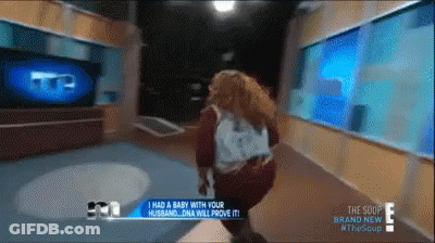 Woman Running In Hallway With Text GIF