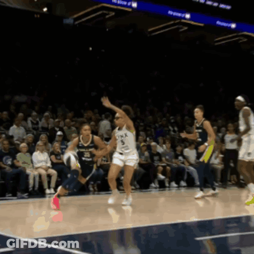 Woman Running On Basketball Court With Minnesota GIF