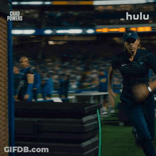 Woman Running On Field With Hulu GIF