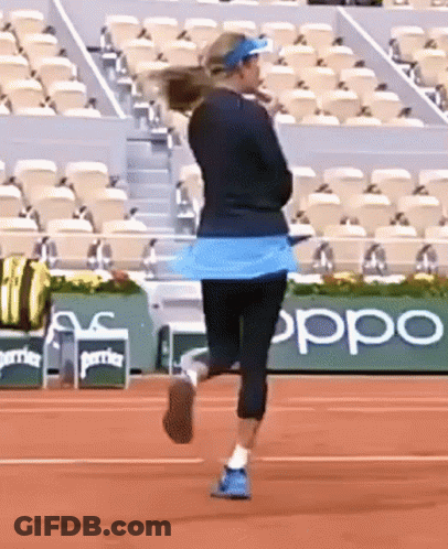 Woman Running On Tennis Court GIF