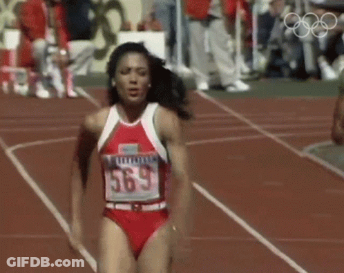 Woman Running On Track Number 563 GIF