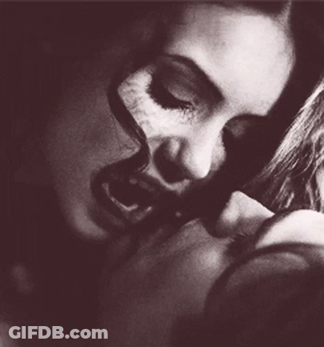 Woman's Black And White Face With Open Mouth GIF