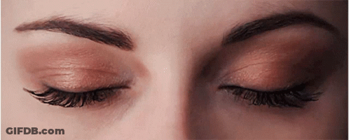 Woman's Eyes Closed Close Up GIF