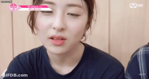 Woman's Eyes Closed Mouth Open GIF