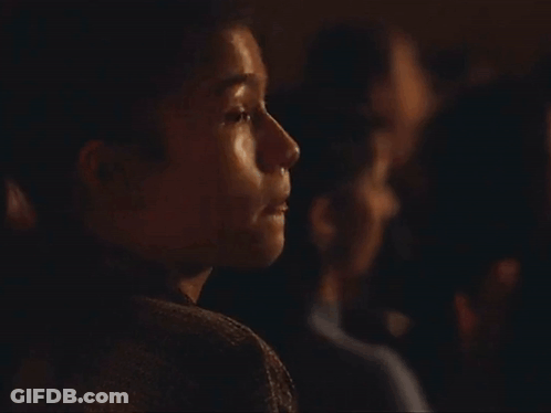 Woman's Face Behind Glass GIF
