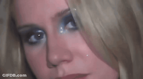 Woman's Face Blonde Hair Blue Eye Makeup GIF
