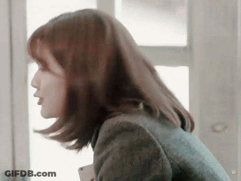 Woman's Face Blowing In Wind GIF
