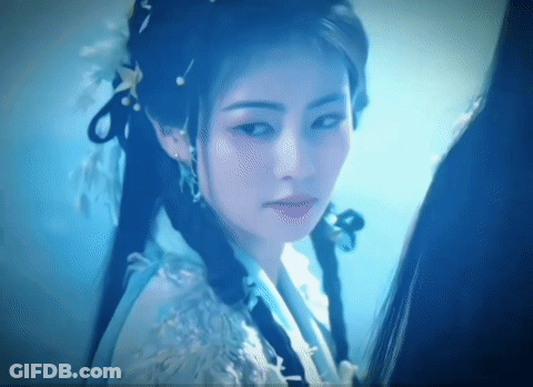 Woman's Face Close Up Blue Background GIF