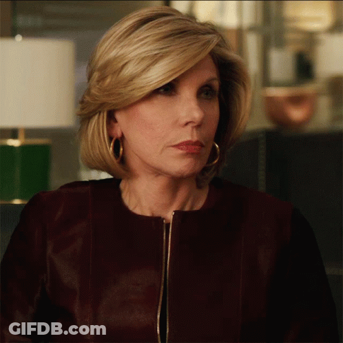 Woman's Face Close Up In Maroon Jacket GIF
