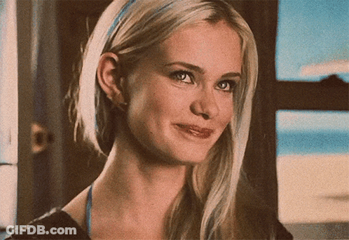 Woman's Face Close Up With Blue Headband GIF