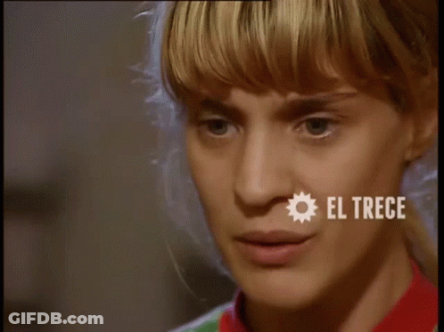 Woman's Face Close Up With El Trece GIF