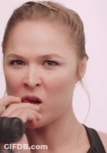 Woman's Face Close Up With Excaliburnerf GIF