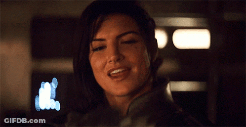 Woman's Face Close Up With Forehead Tattoo GIF