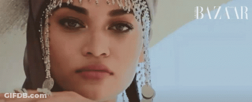 Woman's Face Close Up With Harper's Bazaar Logo GIF