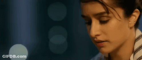 Woman's Face Close Up With Light Behind GIF