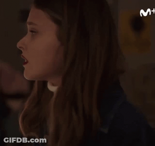 Woman's Face Close Up With M+ Logo GIF