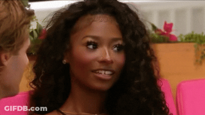 Woman's Face Close Up With Man In Background GIF