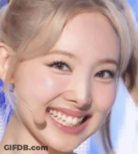 Woman's Face Close Up With Microphone GIF