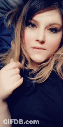 Woman's Face Close Up With Nose Piercing GIF