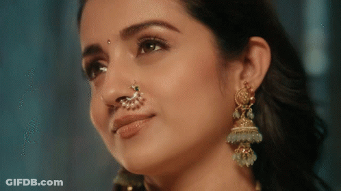 Woman's Face Close Up With Nose Ring GIF