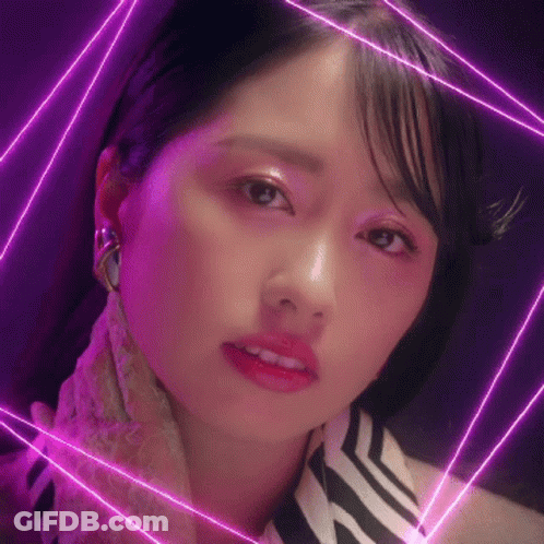 Woman's Face Close-Up With Purple Lights GIF