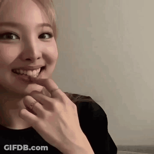 Woman's Face Close Up With Ring GIF