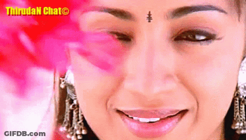 Woman's Face Close Up With Thirugan Chat Watermark GIF