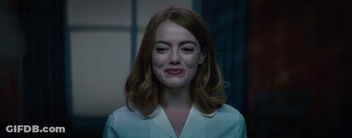 Woman's Face In White Shirt GIF