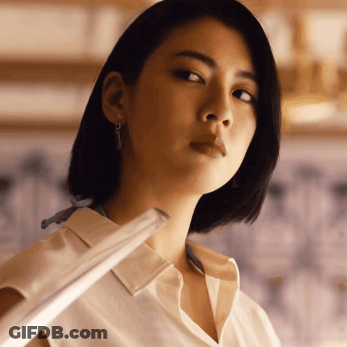 Woman's Face In White Shirt GIF