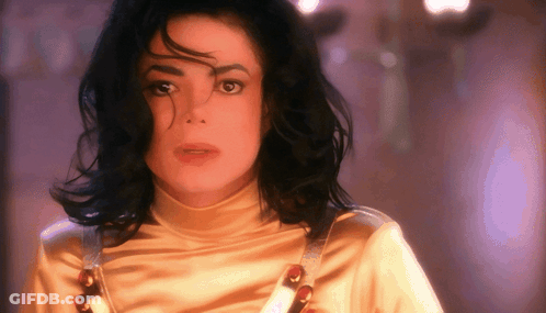 Woman's Face In Yellow Top GIF