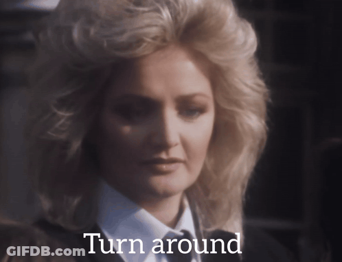 Woman's Face Saying Turn Around GIF
