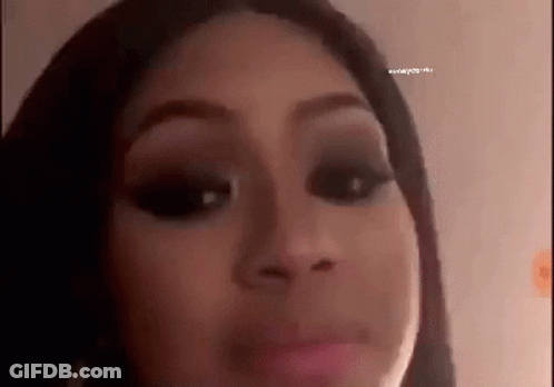 Woman's Face With Black Eye Shadow GIF