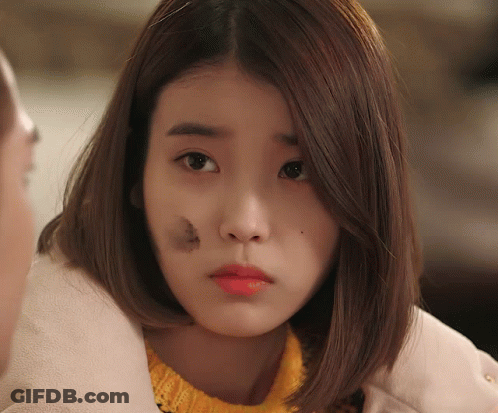 Woman's Face With Black Spot GIF