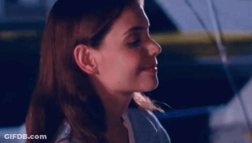 Woman's Face With Eyes Closed And Mouth Open GIF
